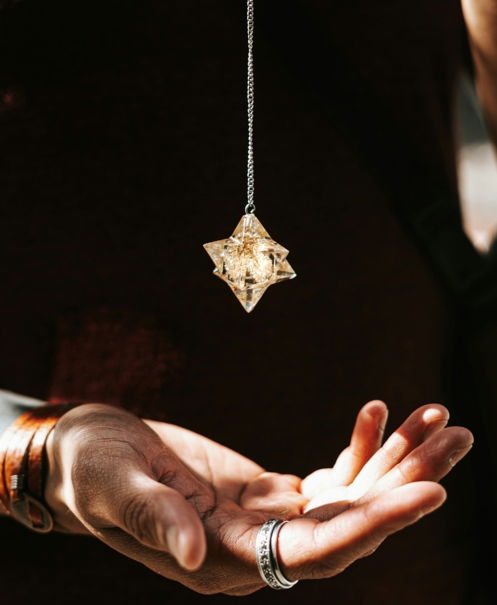 a person holding a key chain